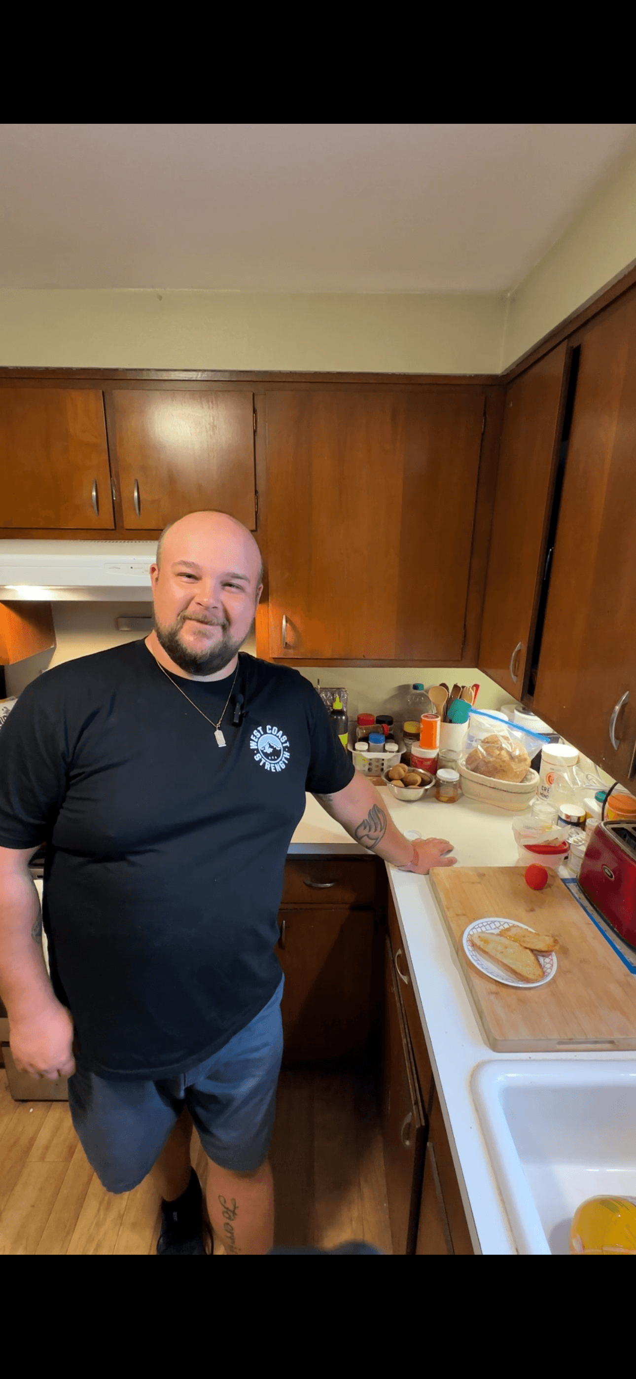 Nicholas Hadley in the kitchen with fresh baked bread.